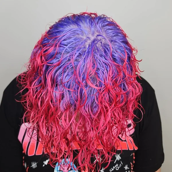 vivid purple to pink all over curly hair