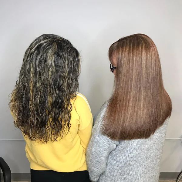 two clients showing off their different hair preferences