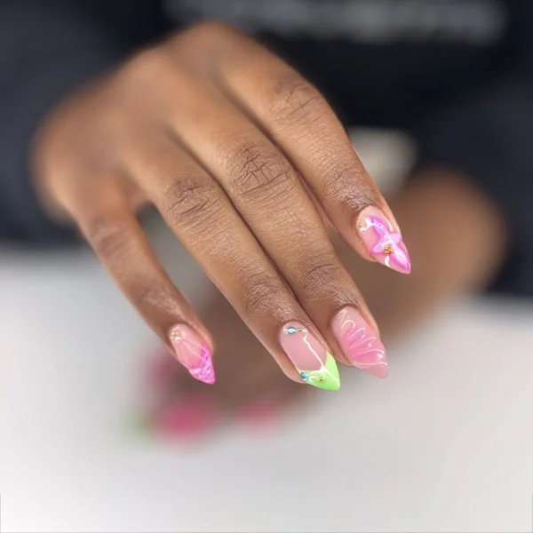 bright pink and green nail art with jewels manicure